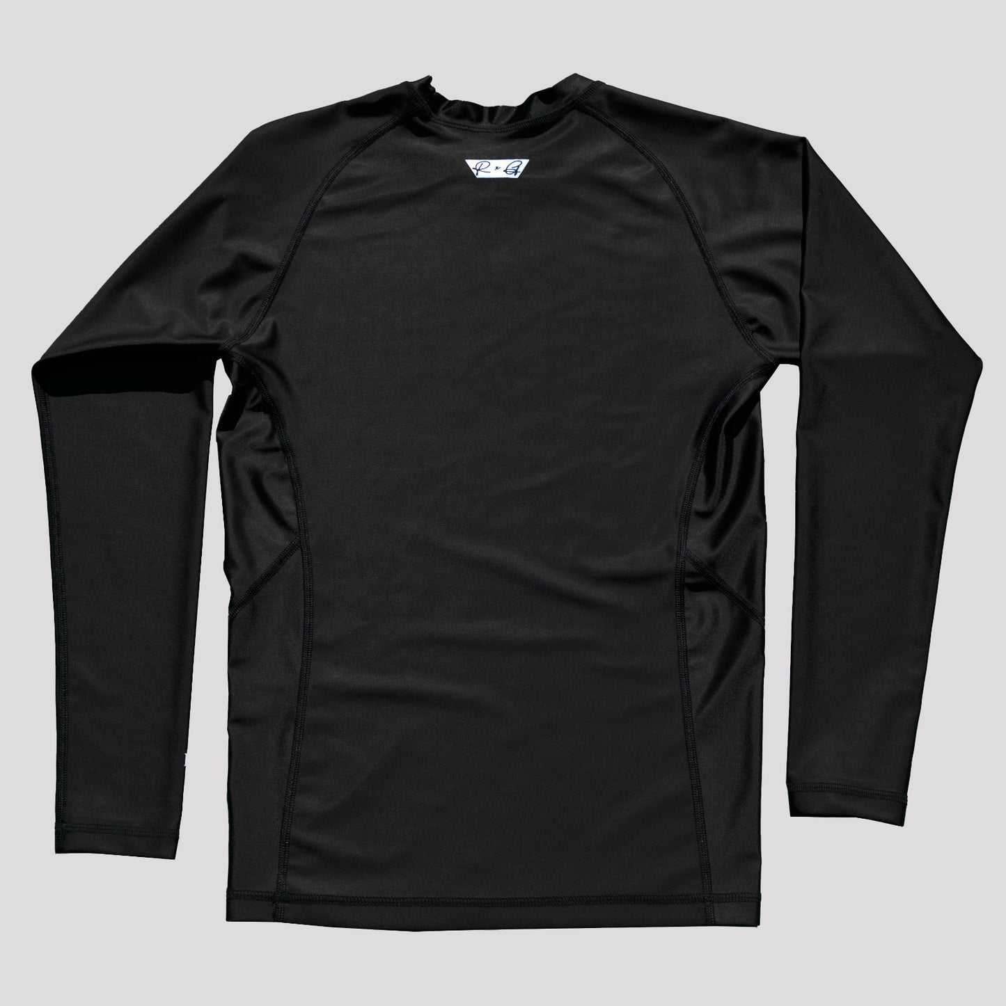 Women’s STAPLE Long Sleeve Rashguard - FEATURE